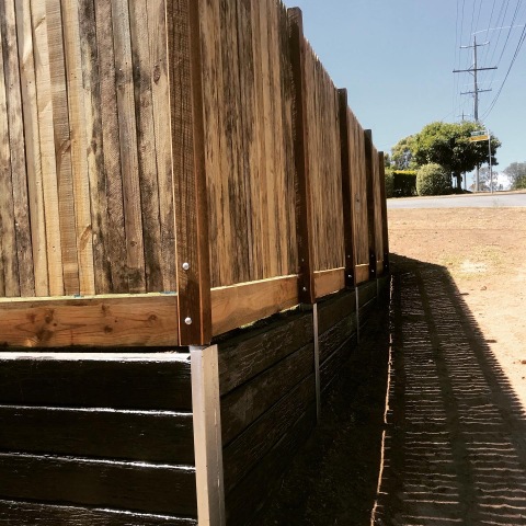 Rycan Retaining and Earthworks Retaining wall with Timber Fence on Top