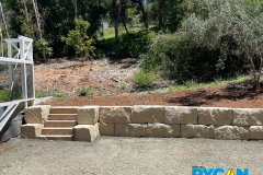 1m High B Grade Sandstone Block Retaining Wall with External Sandstone Staircase