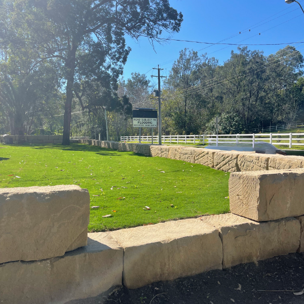 B Grade Sandstone Block Retaining Wall with grass