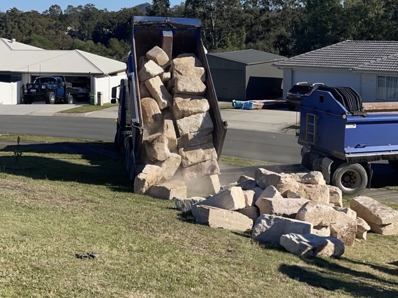 sandstone blocks south east queensland helidon random boulders being tipped off truck
